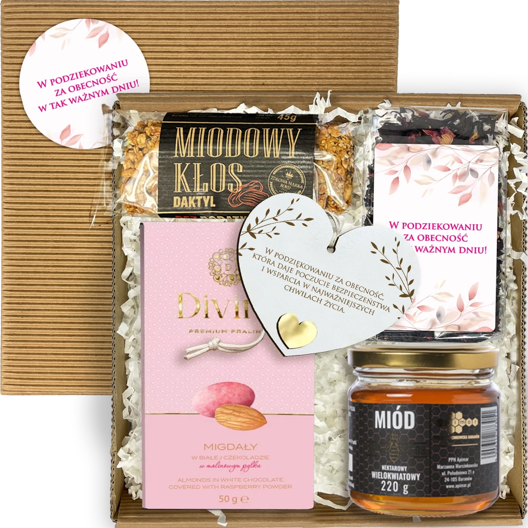 Box komunijny z herbatą, miodem i zawieszką serce Otwarty box komunijny z herbatą, miodem, batonem, migdałami i zawieszką serce
